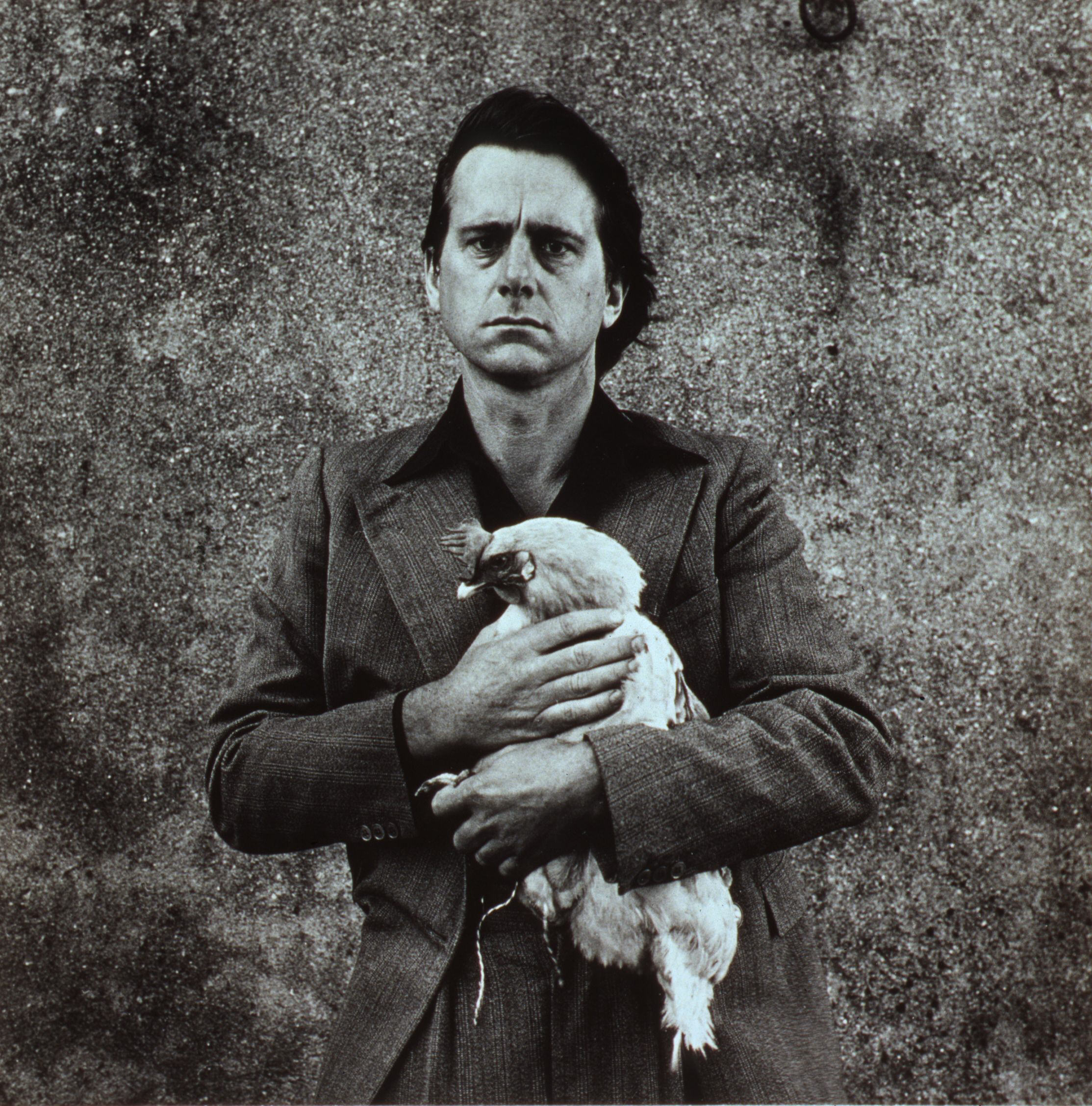 <p>Peter Peryer, <i>Self portrait 1977</i>,<i>&nbsp;</i>1977, black and white photograph, silver bromide print,&nbsp;<span style="color: rgb(0, 0, 0); font-family: Theinhardt, Arial, sans-serif; font-size: 16px;">Auckland Art Gallery Toi o Tāmaki, purchased 1981</span></p>
