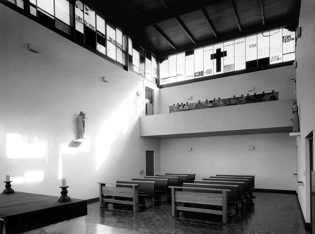 <p>A view of the interior of the chapel; <em>The Way of the Cross</em> is visible on the back wall.</p>