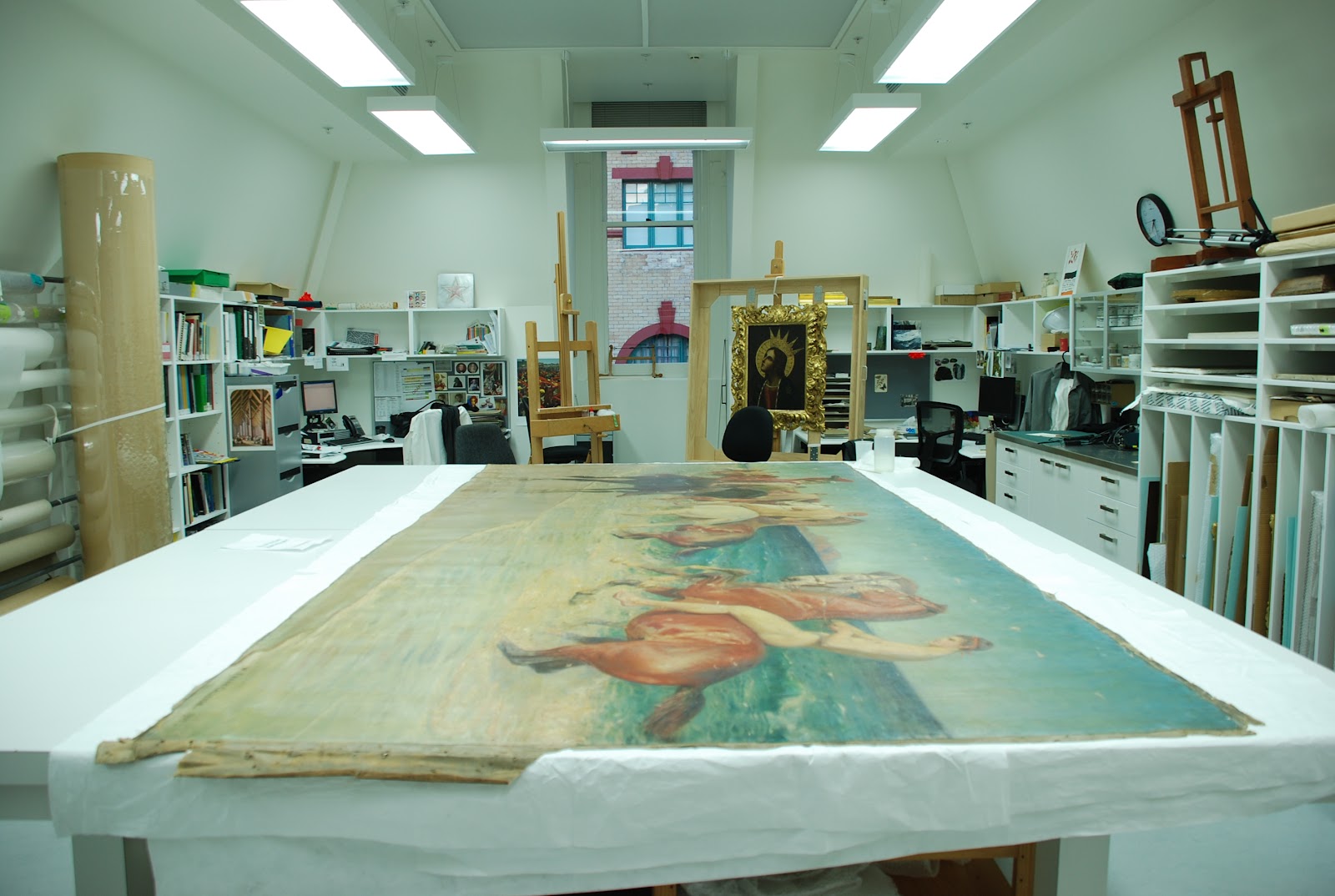 <p>Awaiting treatment in the painting conservation studio</p>