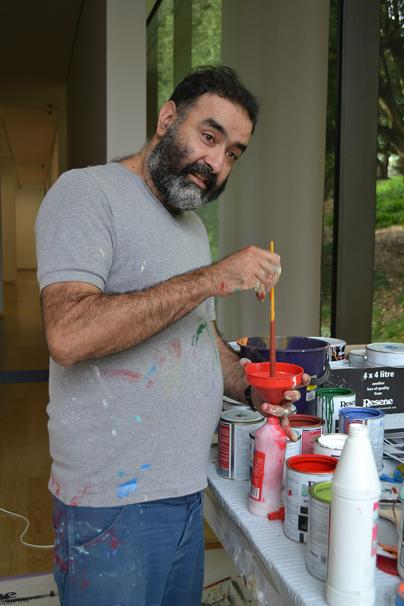 <p>Chilean artist Ignacio Gumucio creating his site specific mural <em>Everybody knows that our cities were built to be destroyed</em> at Auckland Art Gallery, April 2016. Photos &copy;&nbsp;Amparo Irarr&aacute;zaval</p>
