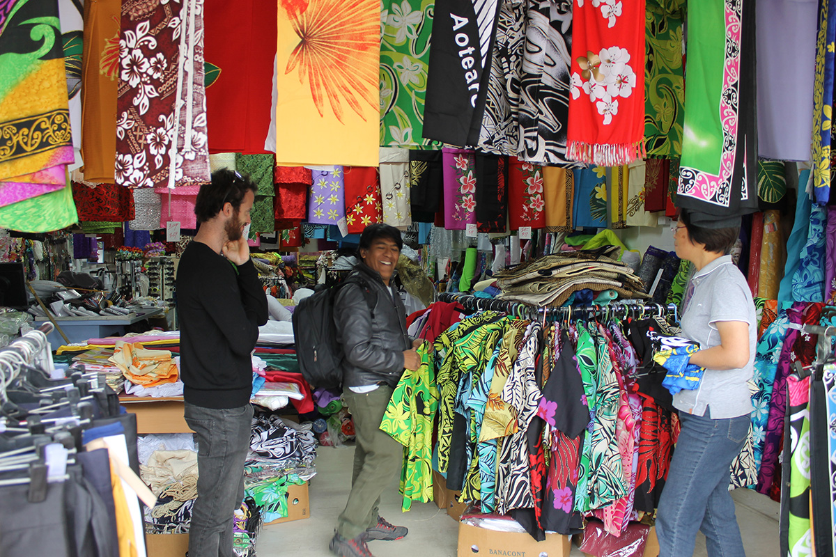 <p>Bernardo checks out the a&#39;loa shirts and lavalavas at the Otara Fleamarket</p>