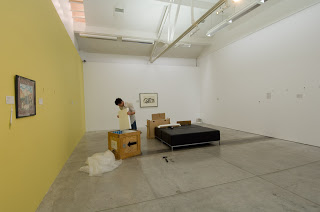 <p>Preparator&nbsp;Shane Norrie carefully putting an artwork in its crate.</p>
