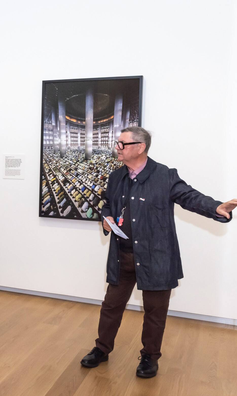 <p>Ron Brownson conducting a tour in&nbsp;<em>Civilisation, Photography, Now</em>, Auckland Art Gallery Toi o Tamaki, 2020.</p>