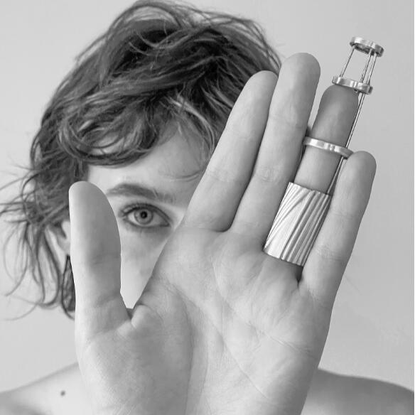 <p><strong>Lecture: Adorning Modernism &ndash; Between Skin and Structure by Gina Hochstein</strong></p>

<p><strong>Auditorium</strong></p>

<p><strong>3pm</strong></p>

<p>Through wearable artefacts for the female body, Gina Hochstein examines how design positions, scales and politicises bodies in space. Grounded in Titirangi&rsquo;s modernist legacy, her work reclaims adornment as a critical tool for challenging traditions of objectification and spatial control. After the lecture, try on a piece of Hochstein&rsquo;s thought-provoking jewellery.</p>

<p>Gina Hochstein is a lecturer in the School of Architecture at Unitec. Her research investigates the intersection of craft practice, body politics and spatial experience, and she produces works of adornment for the female form that critically engage architecture and gender.</p>

<p><strong>Image credit:&nbsp;</strong>The Corset ring by Gina Hochstein. Photo: Emma Bass.</p>
