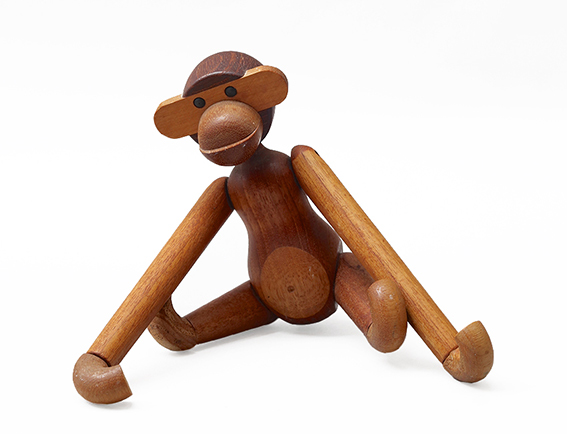 <p>Kaj Bojesen (1886&ndash;1958)<br />
Manufactured by Kaj Bojesen (1886&ndash;1958)</p>

<p><em>The Monkey</em></p>

<p>1951 (designed), teak and limba<br />
on loan from a private collection</p>

<p>Playful, flexible and highly crafted, Bojesen&rsquo;s <em>The Monkey</em> invites imagination, physical interaction, and sensory engagement. After the war, Kaj Bojesen started designing stylised wooden exotic animals that enabled people to fantasise about imaginary lands faraway from post-war Europe. Bojesen&rsquo;s Monkey emerged in the same context as Curious George, which was published in Danish in 1957. Comprising 32 wooden components made out of teak and white limba wood, <em>The Monkey</em> appeals to motor and sensory development: all parts except the head move and rotate; it can sit, stand, or it can hang or be used as a hook.</p>