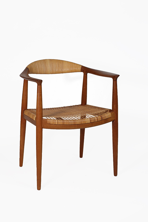 <p>Hans J Wegner (1914&ndash;2007)<br />
Manufactured by Johannes Hansen (circa 1940&ndash;1992)</p>

<p><em>The Round Chair (The Chai H501 r), J</em></p>

<p>1949 (designed), teak, cane<br />
on loan from a private collection</p>

<p>Hans Wegner&rsquo;s Round Chair made history when it was used in the first-ever televised US presidential debate, which took place between John F Kennedy and Richard Nixon in September 1960. Selected by the television station&rsquo;s owner, who also collected Danish furniture, the chair was chosen for its connotations of modernity and democracy that aligned with the values promoted for America&rsquo;s post-war national identity and particularly resonated with the themes in JFK&rsquo;s marketing campaign. The success of the chair&rsquo;s inclusion was such that afterwards it was referred to by American audiences as simply &lsquo;The Chair&rsquo;.</p>