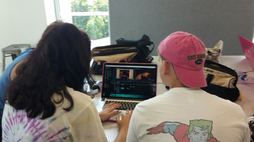 <p>Interns working hard to complete the rough cut of their film</p>