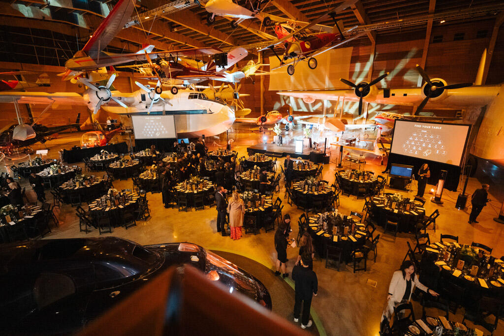 https://cdn.aucklandunlimited.com/conventions/assets/media/go-for-gold-charity-dinner-motat-aviation-hall-banuet-57.jpg
