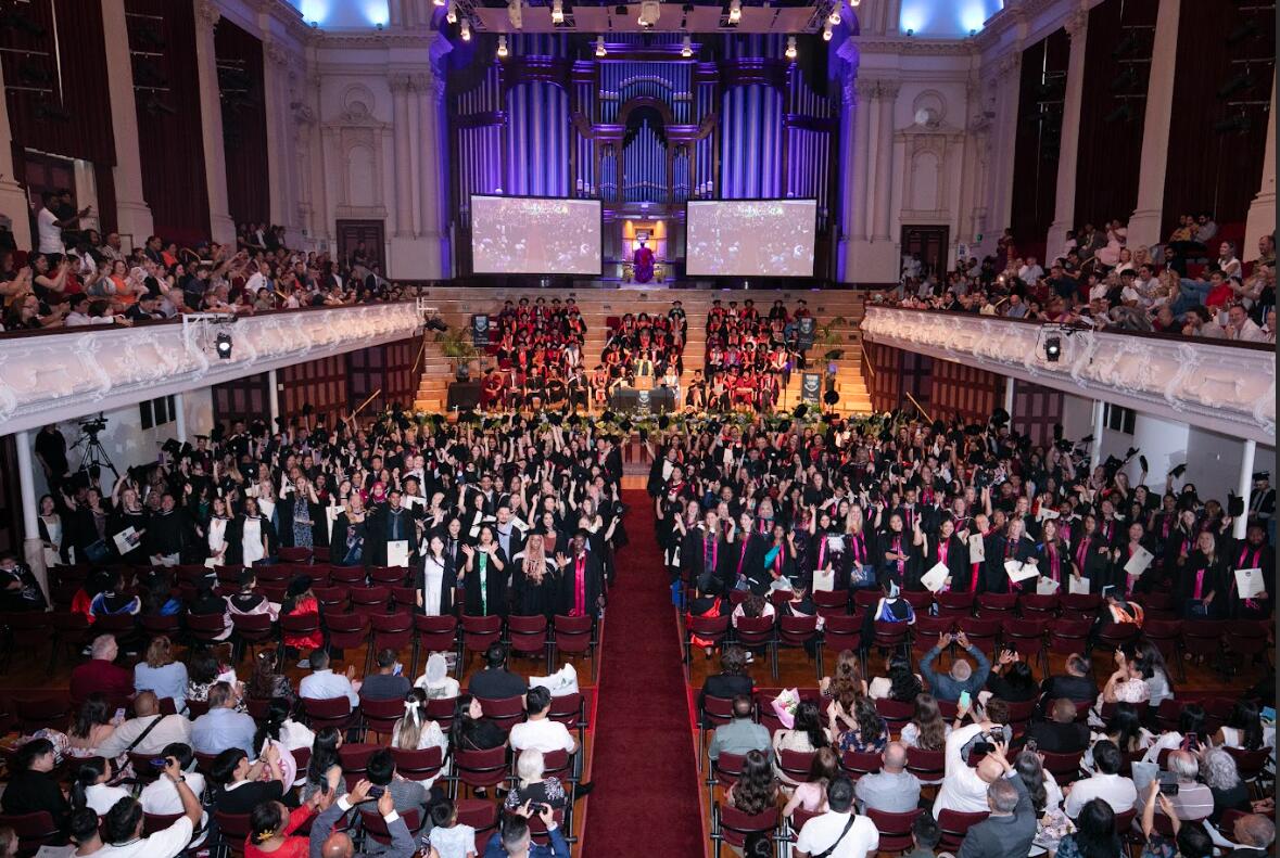 "Guests and students... love the ambience of the Town Hall, ... [and] the presence and use of the organ – backlit in university blue!"