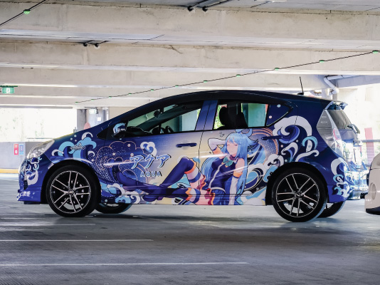 A car with anime artwork 