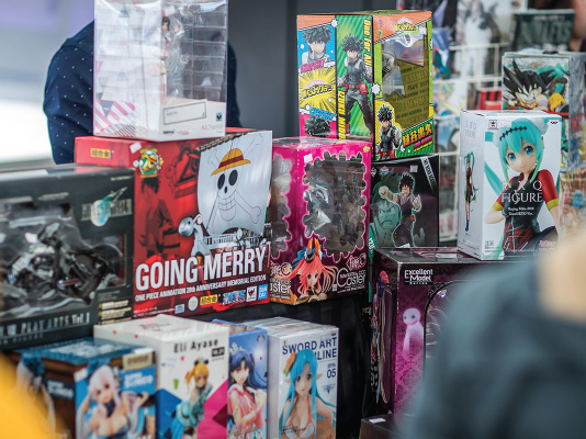 Merchandise at a stall at the Overload convention