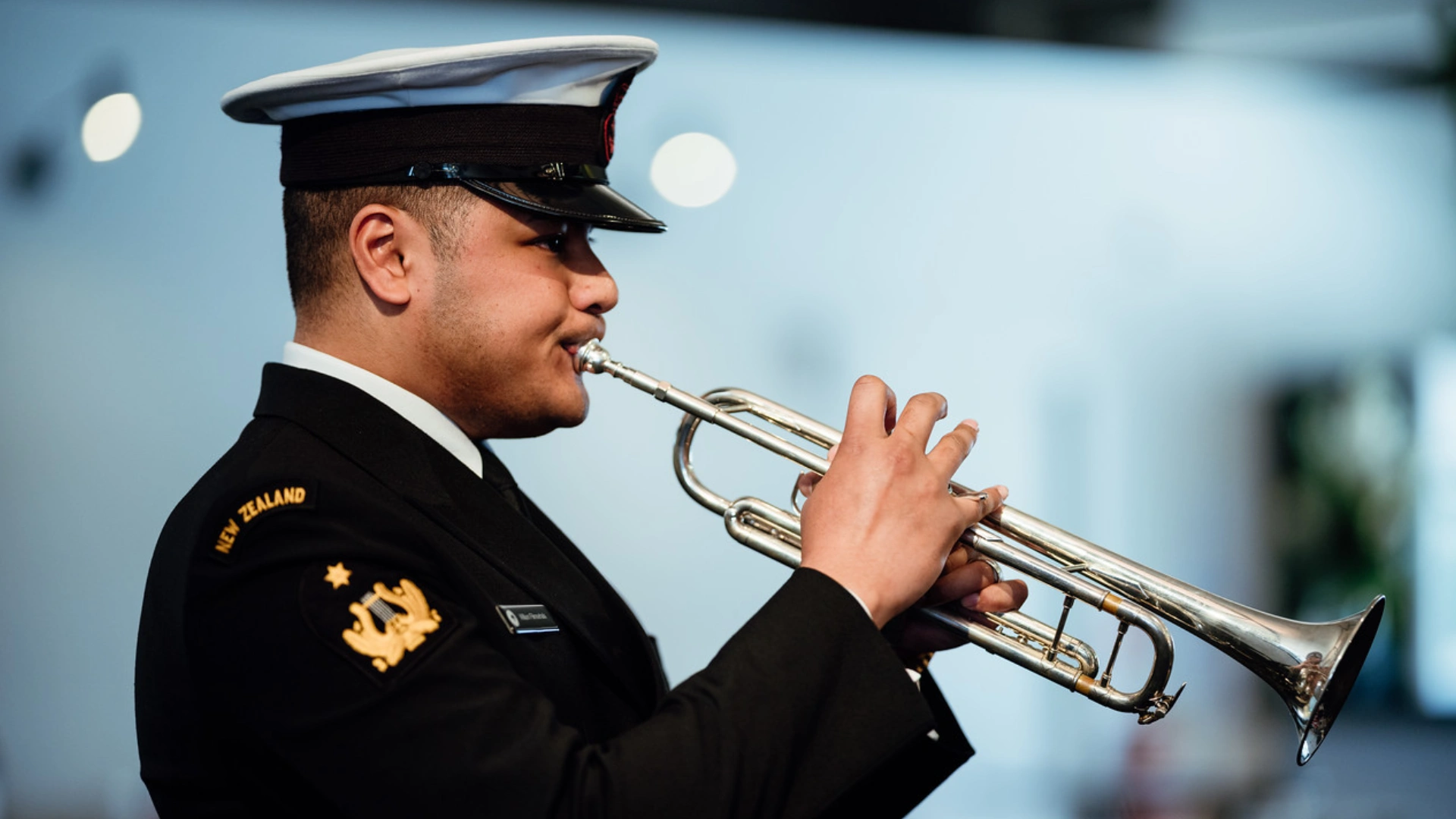 https://cdn.aucklandunlimited.com/maritime/assets/media/merchant-navy-day-man-playing-beugle.webp