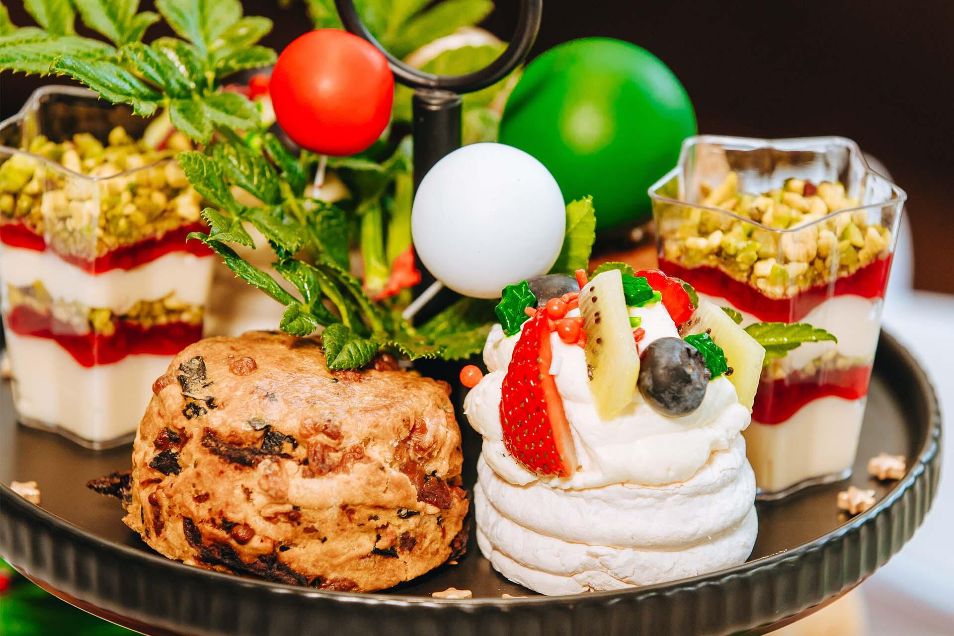 https://cdn.aucklandunlimited.com/zoo/assets/media/auckland-zoo-christmas-high-tea-close-up.jpg