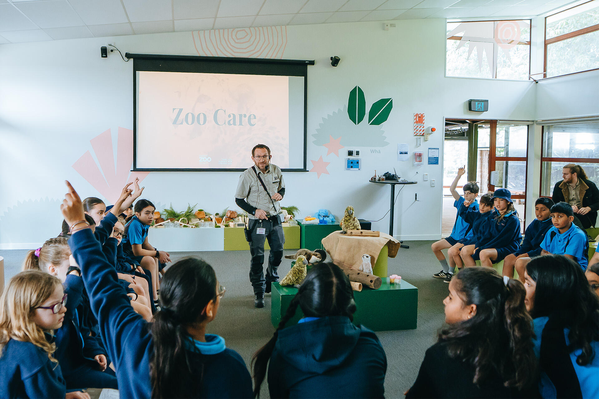 https://cdn.aucklandunlimited.com/zoo/assets/media/conservation-learning-facilitator-nic-charlton-engaging-students-in-the-zoo-care-education-session.jpg