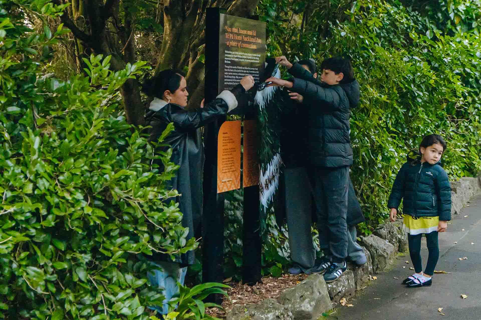 https://cdn.aucklandunlimited.com/zoo/assets/media/unveiling-the-waimihi-soundscape-sign.jpg